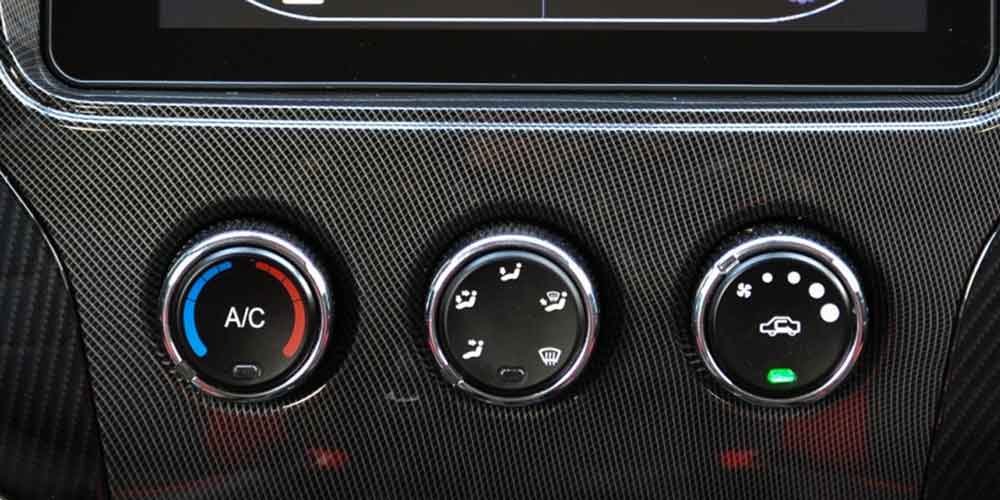 Does Fuel Consumption Increase in Hot Weather Blog illustration - Car air conditioner settings button